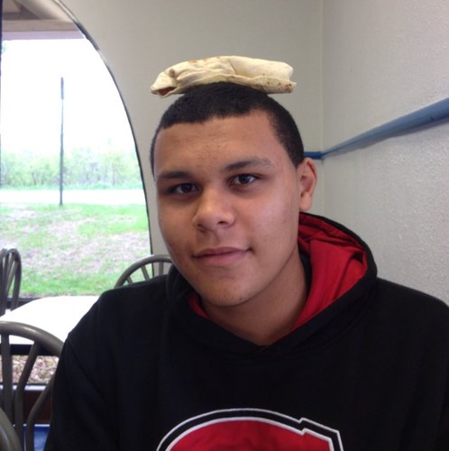 Putting stuff on a black guy