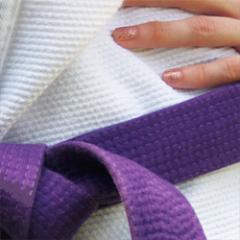 BJJFeminista's profile picture. Feminist. BJJ Purple Belt.