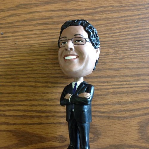 I am the bobble head of Calgary's mayor, Naheed Nenshi. I'm out seeing the world for a bit. Hope the mayor doesn't mind. Not affiliated with the mayor.