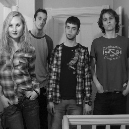 We're a brother & sister team who decided it was time to start a band. We recruited a really lanky guy and the Dark Knight and that was that.