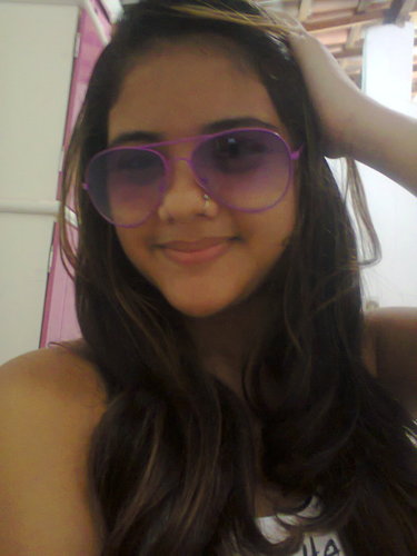 amo futebol sou muito brinkalhona gosto de todas as musicas menos de brega rs'
