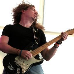 I'm a full-time professional musician, playing live, working in studio and teaching guitar lessons.