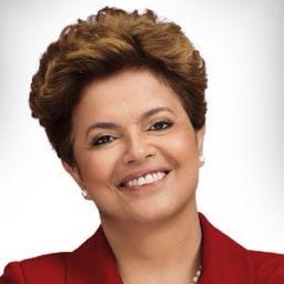 Sou linda, sou presidenta, sou Dilma. Sou uma sátira, se vc não sabe o que é sátira, pega o número na fila do Bolsa Escola. ||