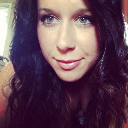 Green eyes, bright smile.