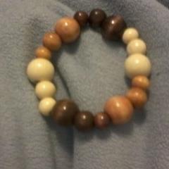 I make homemade bracelets to order.  They stretch to fit just about any wrist! Check them out!