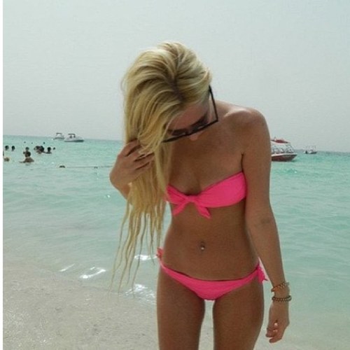 I love tanning and cheerleading. All*star cheerleader!