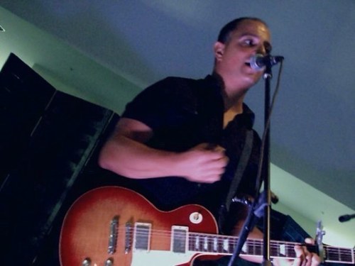 Husband to one, Father to two, Friend to some, Enemy of few, Guitarist to many.