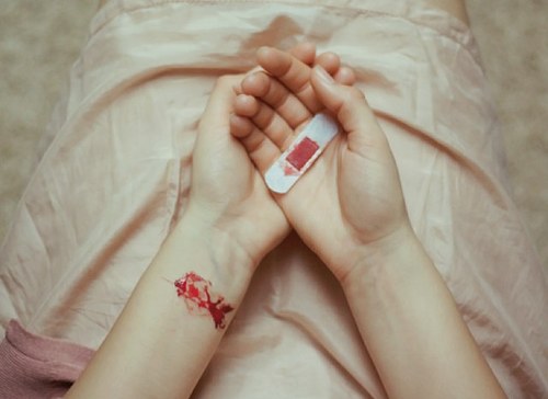 A broken girl who destroys herself slowly. My pain is a punishment I deserve.