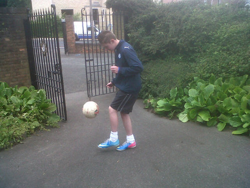 Occasionally, you'll see me playing Football. I'm also a typical 'F1 fan!