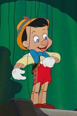 Era una Marioneta de madera normal hecha por Geppetto, pero el Hada azul me dio la vida. Mi conciencia es un grillo llamado Pepito.¡Si miento me crece la nariz!