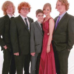 I like ancient history and writing Elvish, my friends call me Tin and I play D&D. 
I'm the small one.