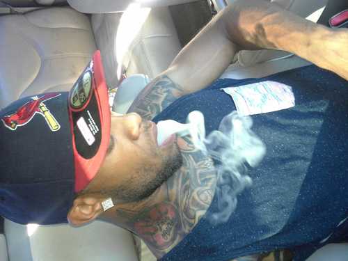 Walkin with ”GOD” But dont get it fucked up Momma aint raised no sucka she raised a gangsta ! and its still #HMB #GanjaGang