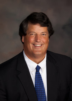 Husband, father, lawyer, coach.