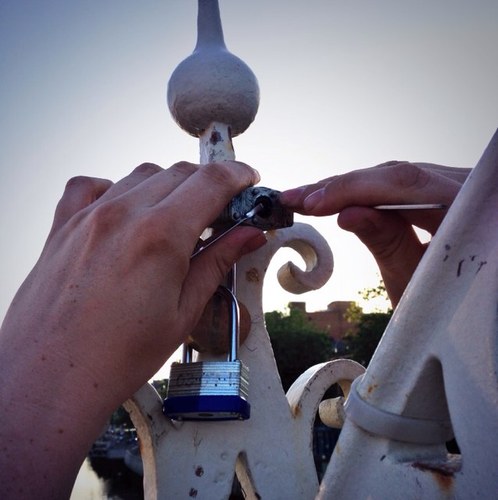 Lockpickers from @TOG_Dublin Liberating the Ha'Penny Bridge of the dreaded Love Locks. Tweets usually from @jayester