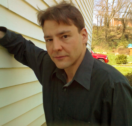 Christopher Carrolli, author of the Paranormal Investigator Series, published by Melange Books.