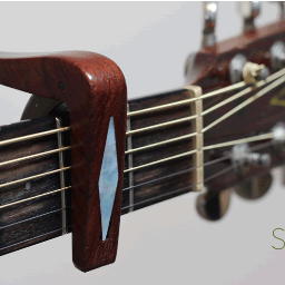 We're a new startup company producing beautiful hardwood guitar capos. Check back in soon for our new design and launch date!