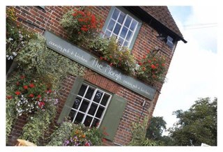 Pub situated in Plough Lane, Downside, Cobham. Contact us on 01932 589 790.