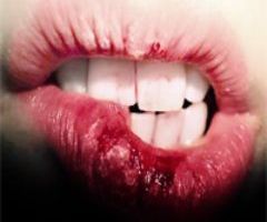 we bite our lips to seduce,numb the pain,figure things out..or habit.