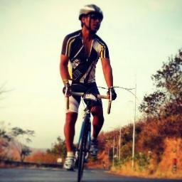 microbiologist, pro-cyclist, swimmer, runner, professor