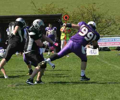 Lancashire Wolverines #54 and UCLan Rams #99.