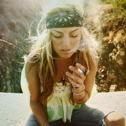 I smoke pot, and look hot doing it. Hippie who loves her weed and sex. Taken and vulgar as hell. Welcome to my life, babes.
