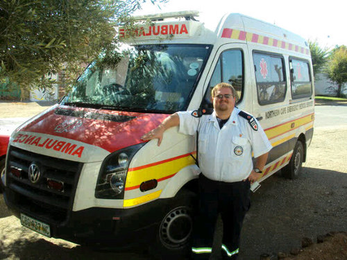 I work on the white bus with the red lights. EMT-INTERMEDIATE.
