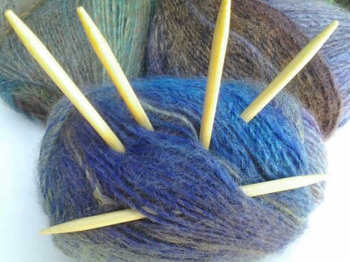 Handknitter specializing in custom dog sweaters.