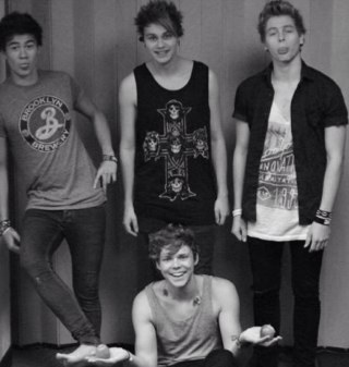 supporting @5sos like every other fan :))