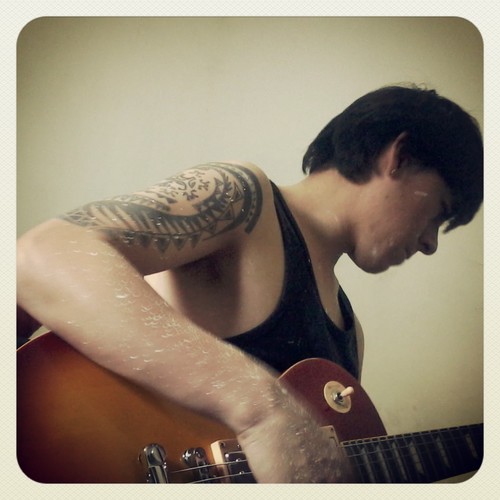 student guitar and singing .. inspired by Latin rhythms and funk jazz bossa also