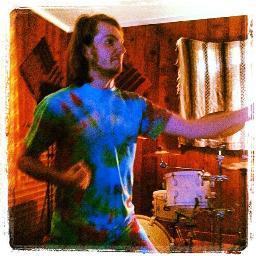 Pretending to be a musician.