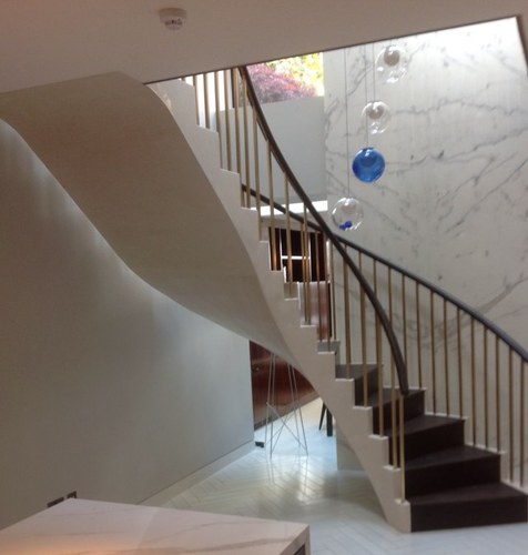 White polished Helical concrete staircases Specialists in concrete stairs