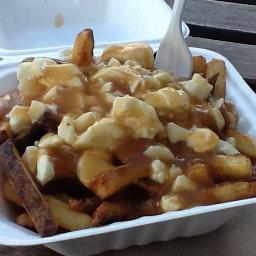 Grading Poutine at every opportunity permitted by my waistline. Usually love them. Mind you, I never met a Donair I didn't like either. :)