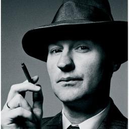 Mycroft Holmes. I occupy a minor role within the British Government  Brother to the famous consulting detective Sherlock Holmes. Don't touch my umbrella.