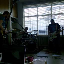 Post-hardcore with gritty thunderous riffs, fat grooves and twin leads.