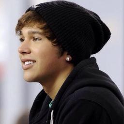 He's from Texas. He can sing like the best. I met him on youtube. I saw him growing up into a star. It happens to be Austin , my hero.