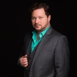 Grammy award winning Metropolitan Opera Tenor, long suffering Seattle Mariners fan, karaoke warbler, weary traveler, and amateur bartender.