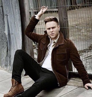 Im in love with an Essex boy,who falls over and rips his trousers on stage.I've seen him live 3 times. He's my idol. Oh yeah,I forgot to mention, his names Olly