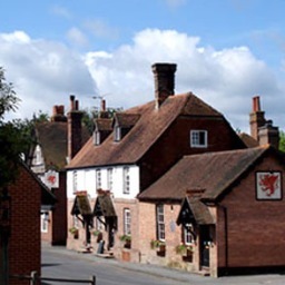Overlooking the Ouse Valley is the village of Fletching and there stands the Inn of the Griffin after a good four centuries.
