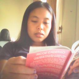 book addict, reads late at night even when there's a test tomorrow, reads while preparing the lessons for the next day