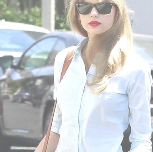 always supporting the blonde girl with curly hair and cowboy boots.