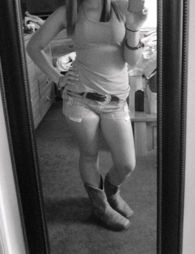 mcjacked up trucks. fishin. huntin. camo. muddin. boots. aint scared to get down and dirty. softball. volleyball. country girl.(: