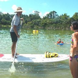 teachin what Cruizin on a Stand Up Paddle Board is all about. SUP West Coast Realty of Venice Realtor