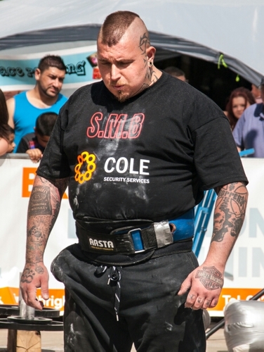tattooist/ strongman