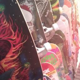 skateboards, rock n roll t-shirts, body jewelry, tapestries, tattoo supplies, tobacco shop