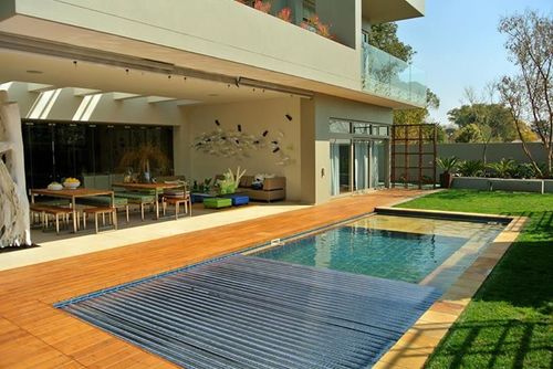 Specialists in the installation of automated pool covers and safety pool products