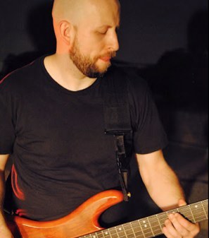 Husband, father, bass player.  Music, movie and sports lover.