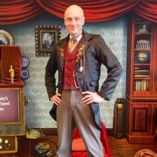 Time Travelling Detective who adventures throughout history 'borrowing' artefacts and bringing them back to teach Primary schools about the past.