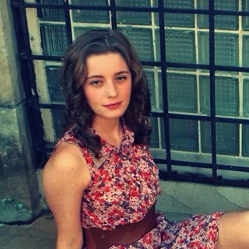 Aspiring writer in a small town, trying to make a difference with her words.