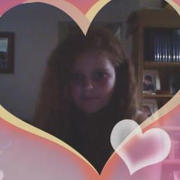 I am 16 and I have curly brown hair with blonde and red high lights I dance in infectious the dance group and love horror movies and 1d