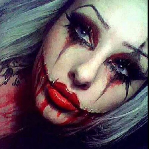 rebelious teen whos got the personality like her father (joker) and a heart like her mother (harley quinn) daddy gave me these scars so that im always smiling